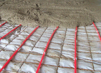 Insul-Tarp in-slab insulation attached to wire mesh under radiant floor heating element.